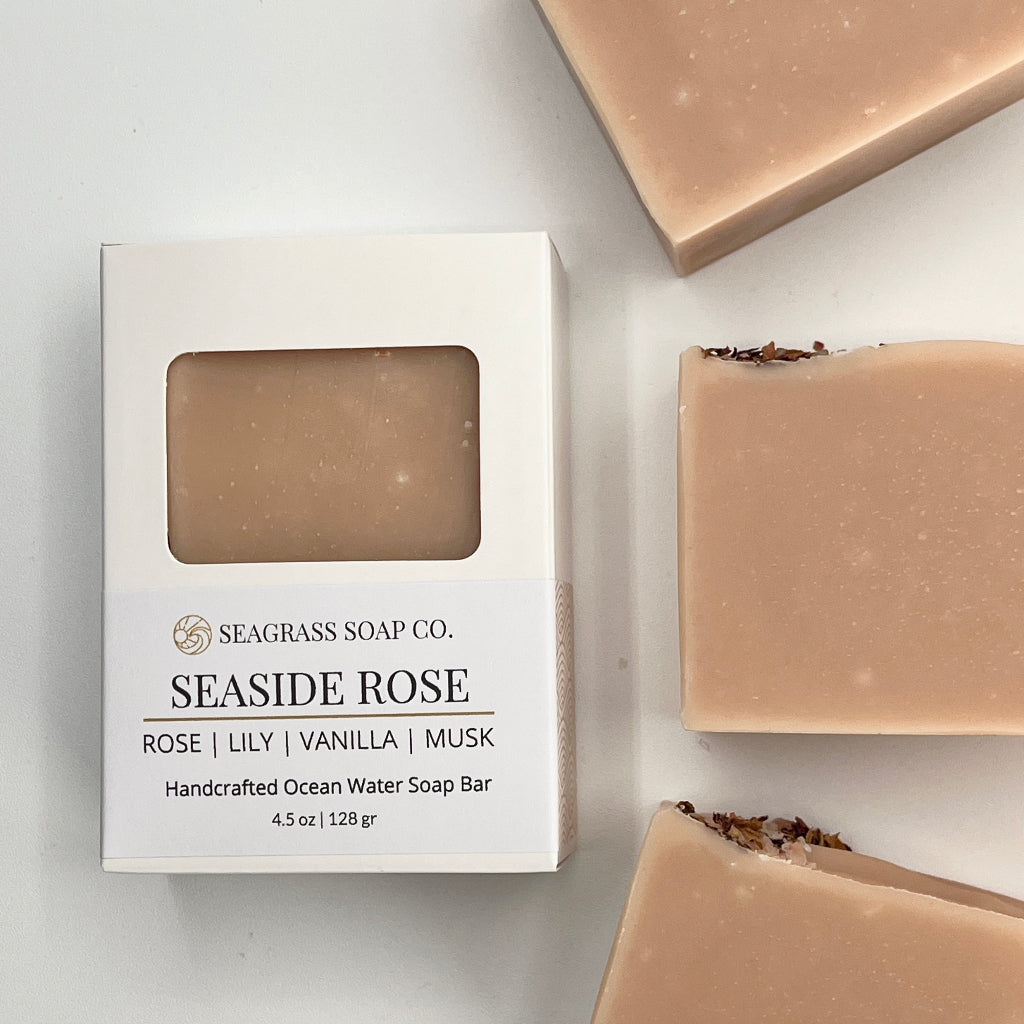 Seaside Rose soap bar with packaging on a light gray background