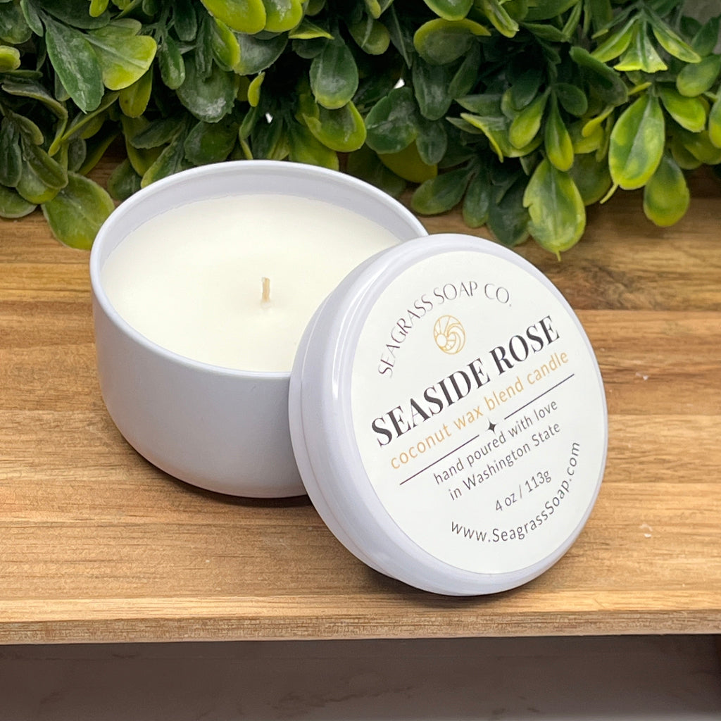 Delicate and fresh scent of roses growing along the sea in a 4oz travel tin candle.