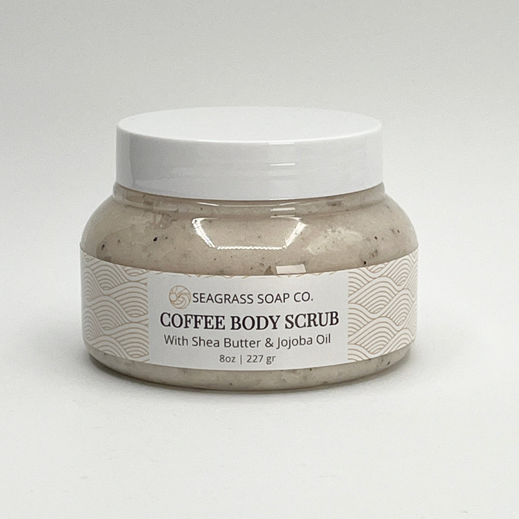 Jar of coffee body scrub with Seagrass Soap Co. label on a white background