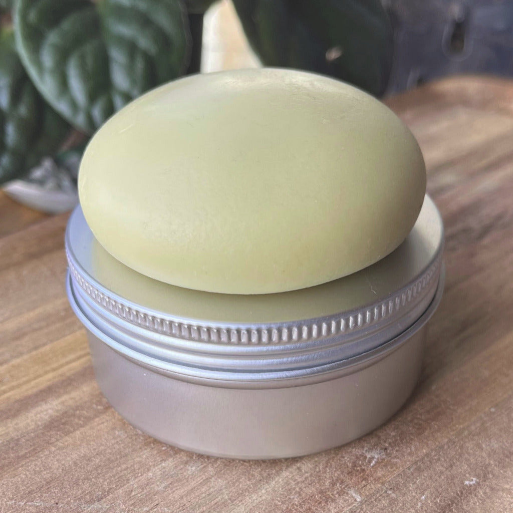 Lotion Stone profile sitting on top of container
