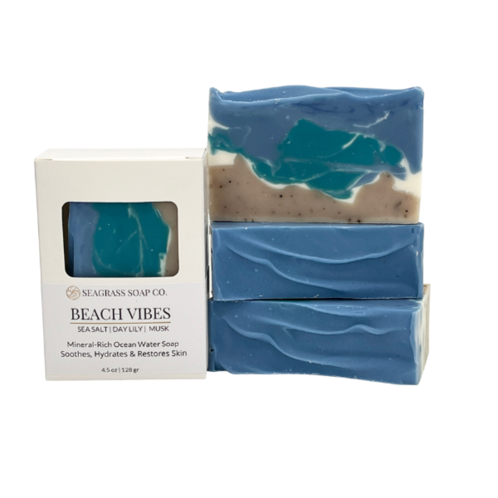 Blue soap bar with packaging labeled 'Beach Vibes' on a white background