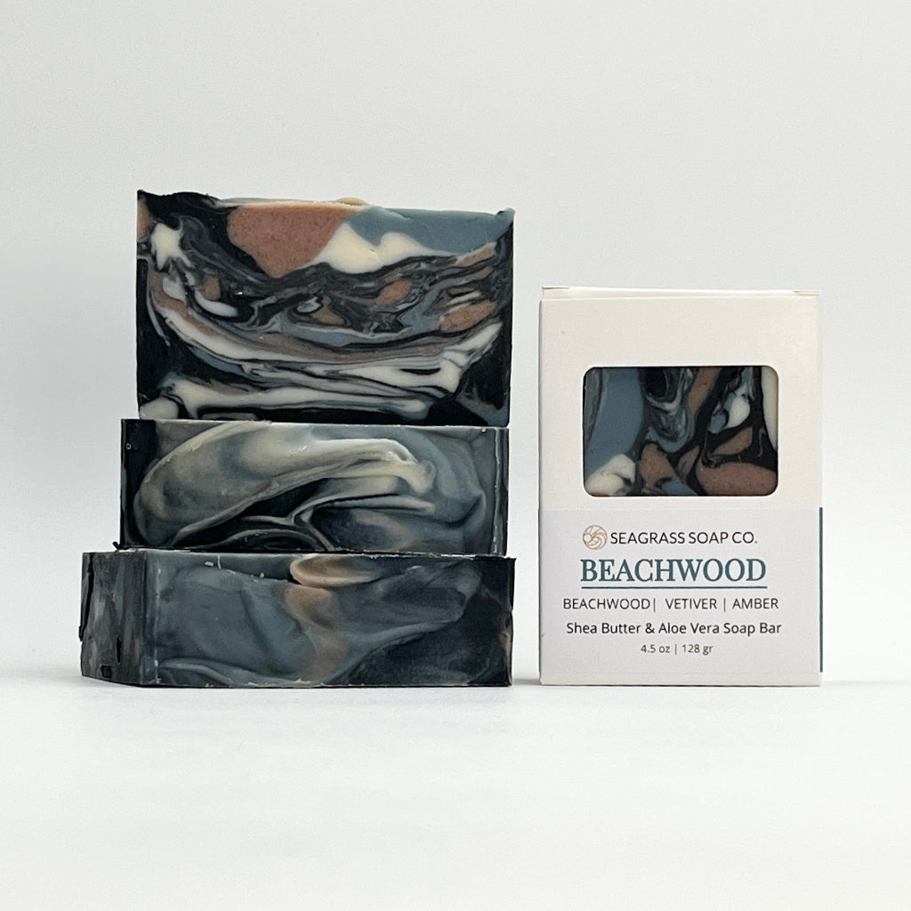 Marbled soap bars with a Seagrass Soap Co. packaging on a white background