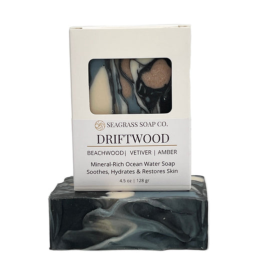 Driftwood bar of soap with a Seagrass Soap Co. packaging on a white background
