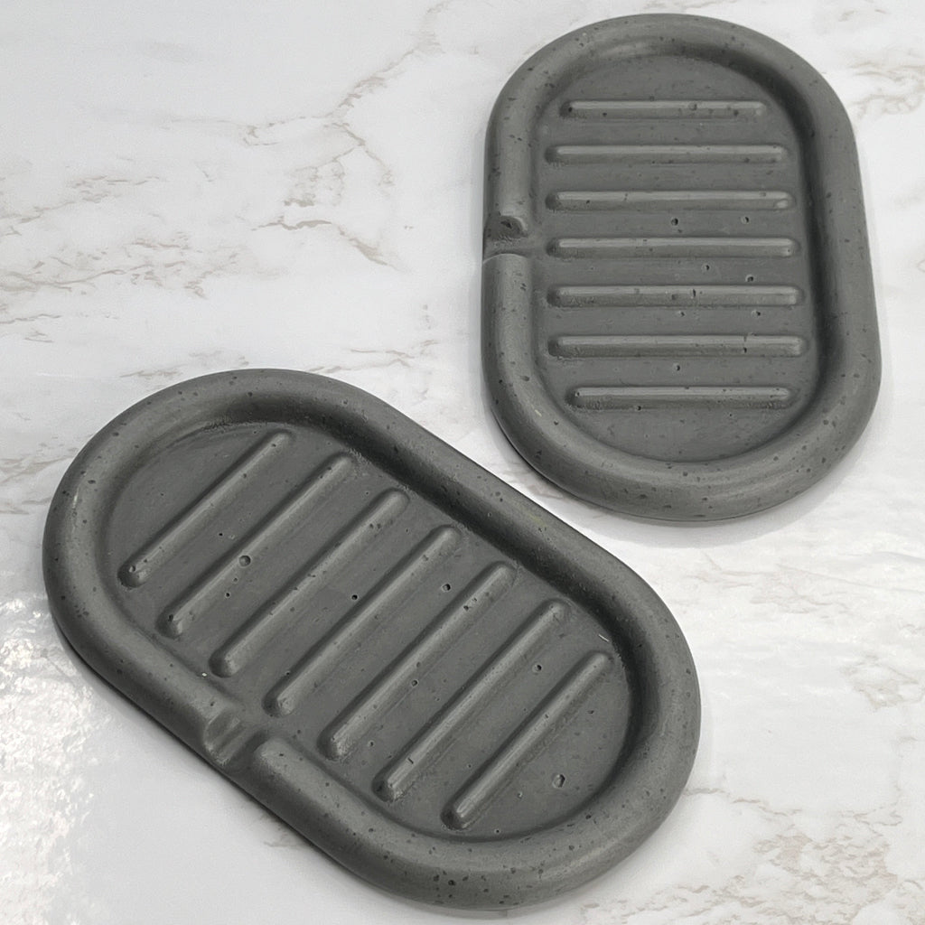 Hand poured self draining concrete soap dish in grey helps keep soap bars dry