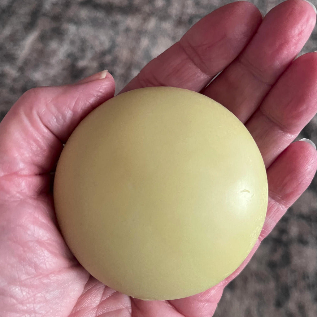 A lotion stone in a and showing the 3 oz size
