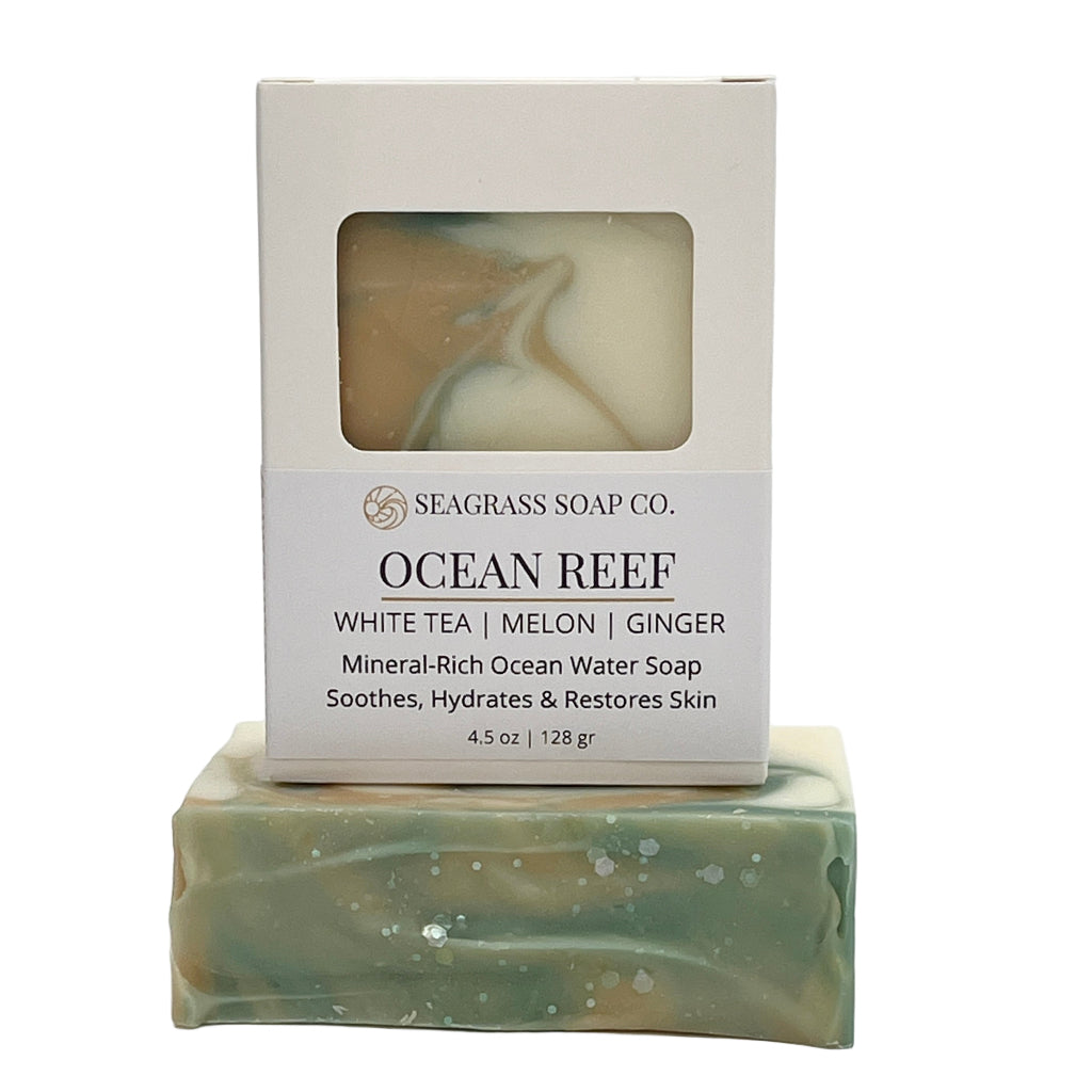 Bar of soap with 'Ocean Reef' packaging on a white background