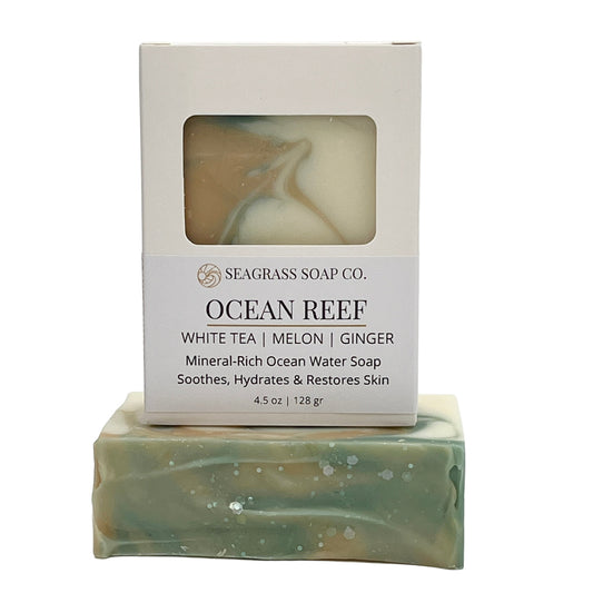 Bar of soap with 'Ocean Reef' packaging on a white background