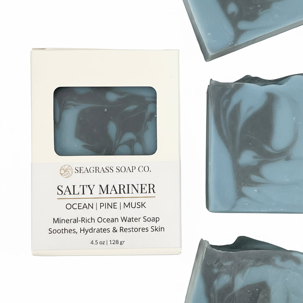 Three bars of Salty Mariner soap and its packaging on a white background