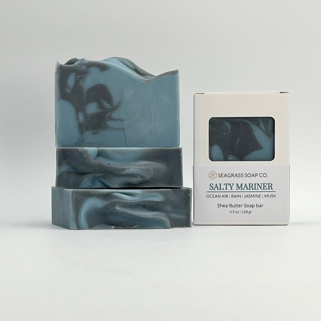 Three Salty Mariner soap bars and box packaging on a white background.