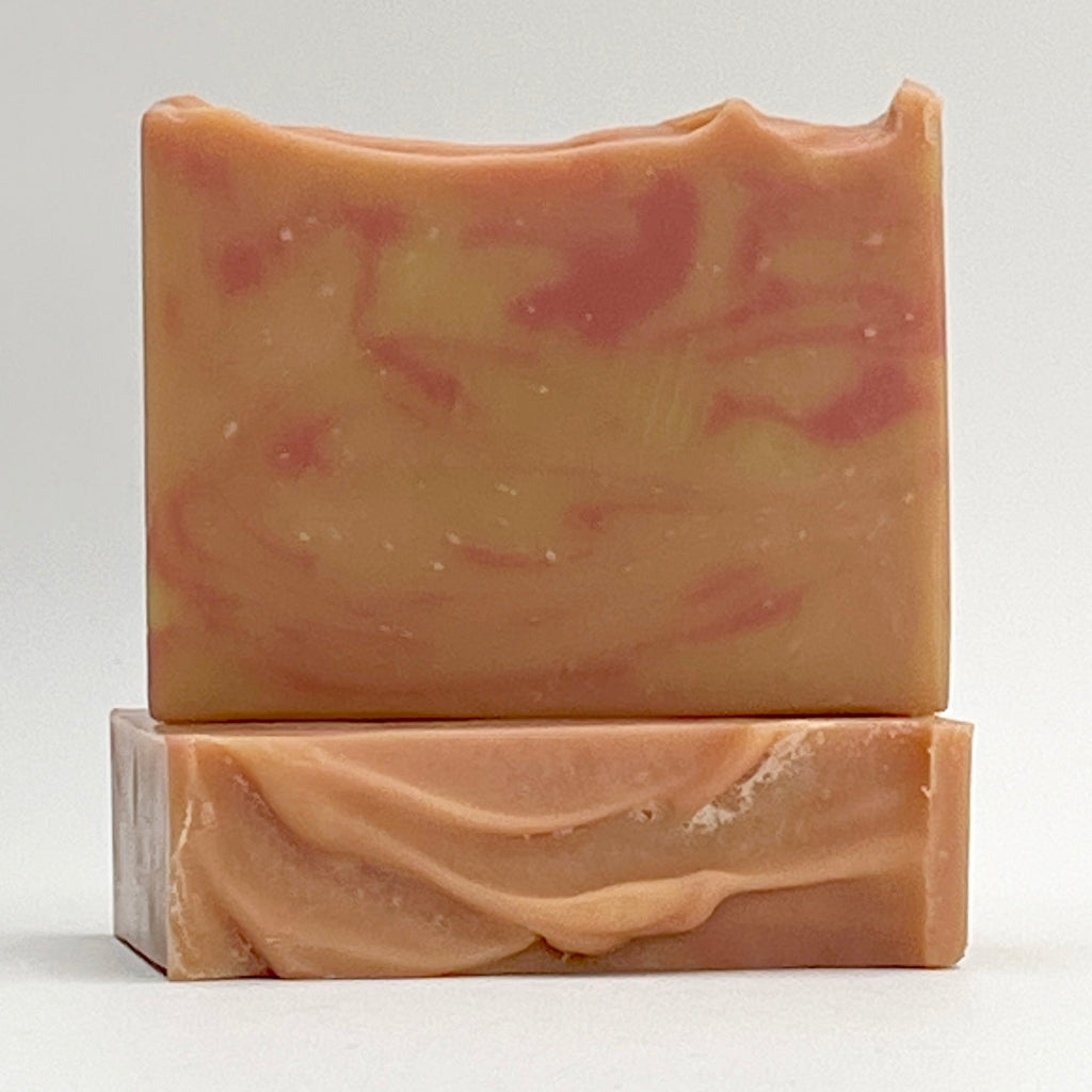 Saratoga Sunset scented with Mango and Papaya and enriched with coconut milk and Shea Butter soap bar on a white background by Seagrass Soap Co.