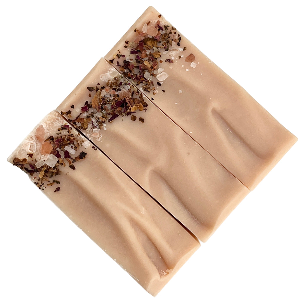 Bar of soap with decorative elements on a white background