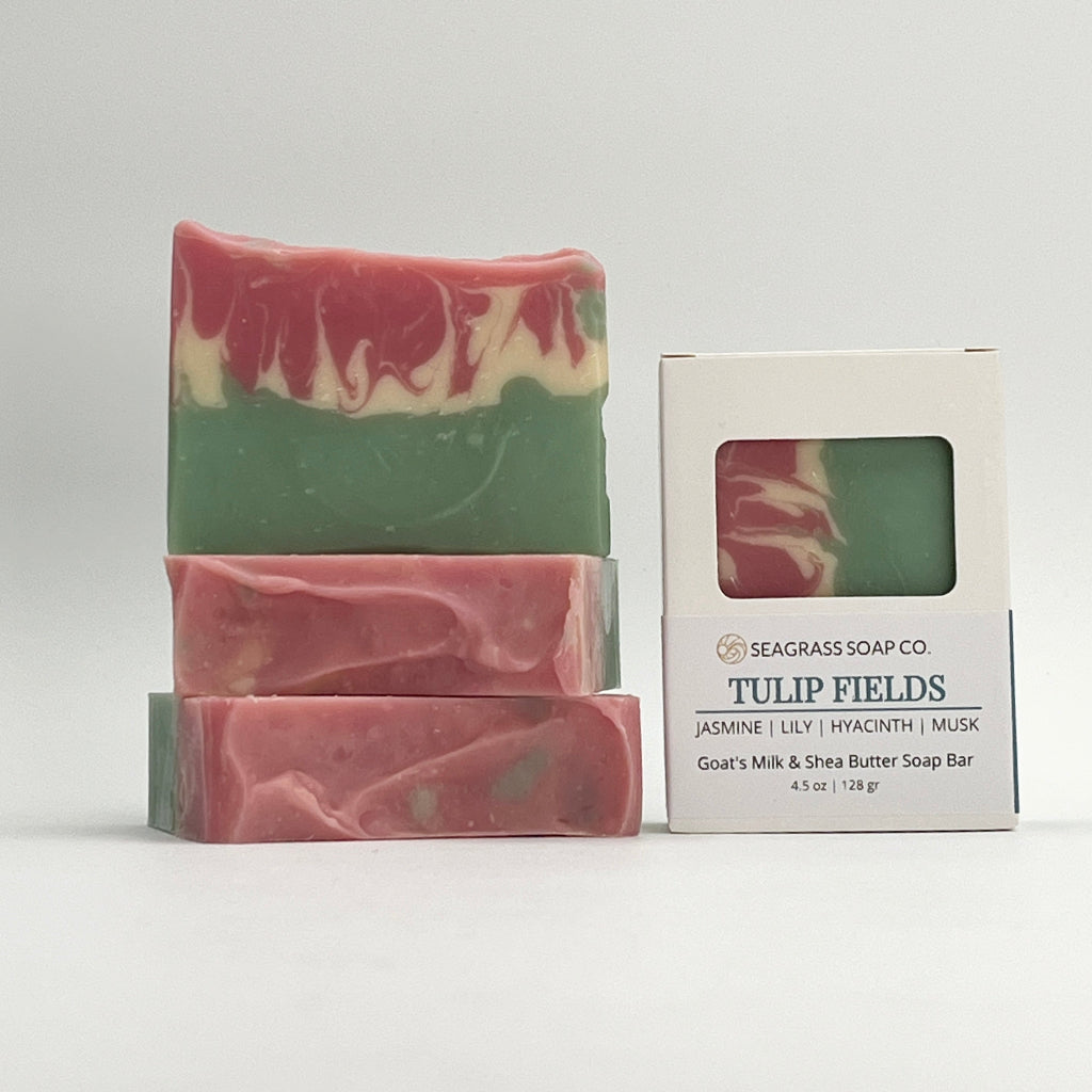 Three bars of Tulip Fields and a box packaging with a white background.