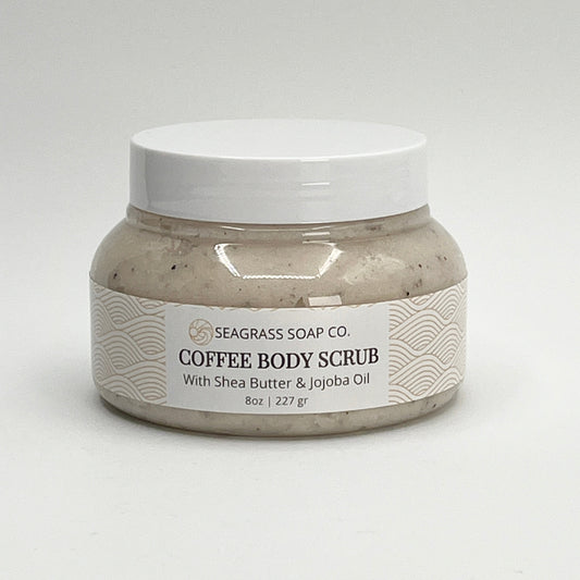 Jar of coffee body scrub with Seagrass Soap Co. label on a white background