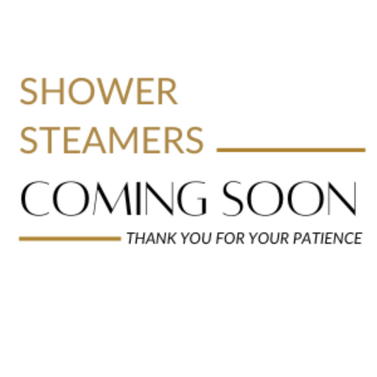 Promotional text for shower steamers indicating 'Coming Soon' on a white background.