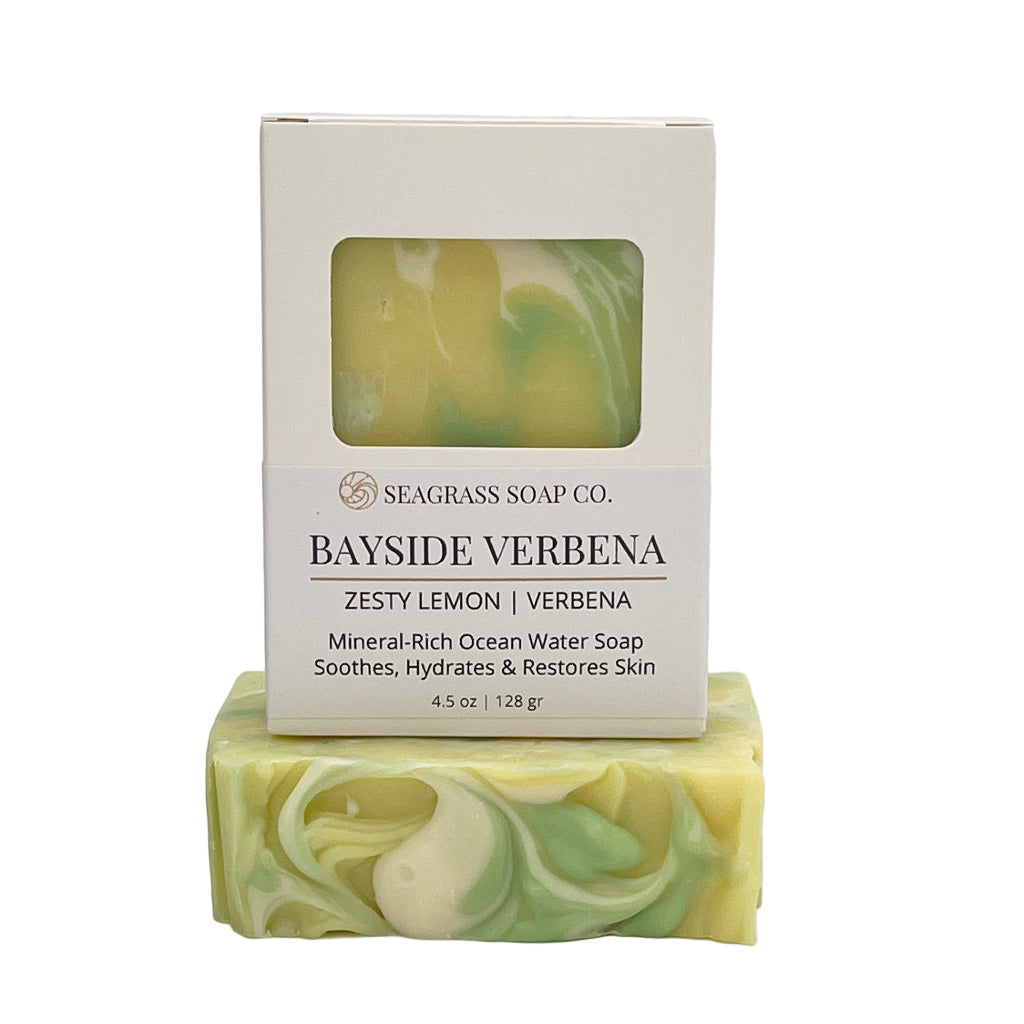 Green and yellow swirled soap bar with packaging on a white background by Seagrass Soap Co on Camano Island, Wa