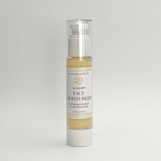 Bottle of Sea Berry Face Moisturizer on a light gray background