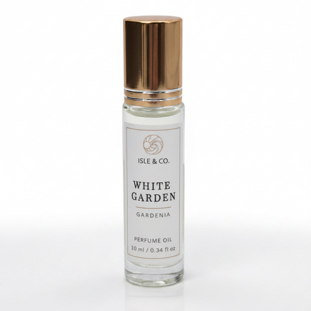 Roll on Perfume oil bottle labeled 'White Garden' by Isle & Co. on a white background