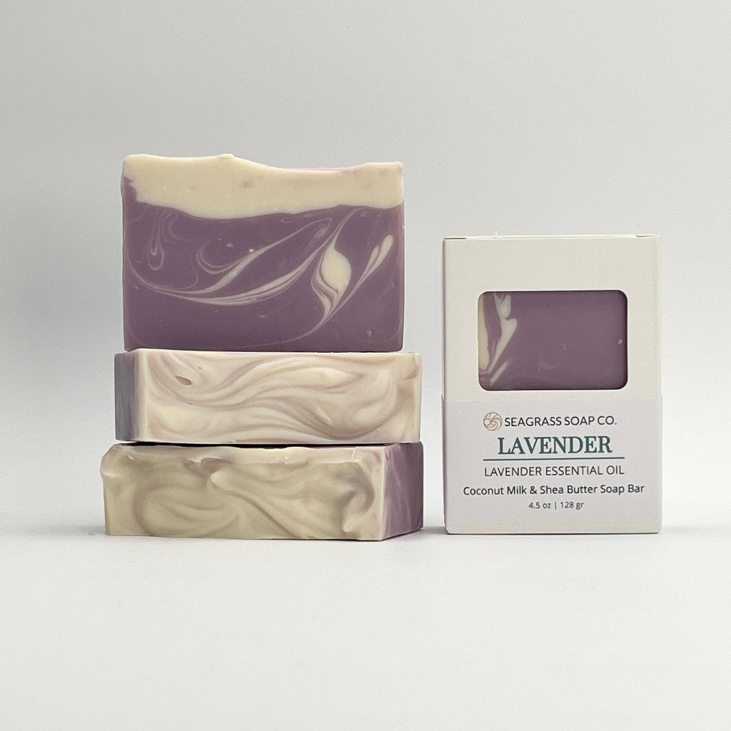 Lavender soap bars and packaging on a white background