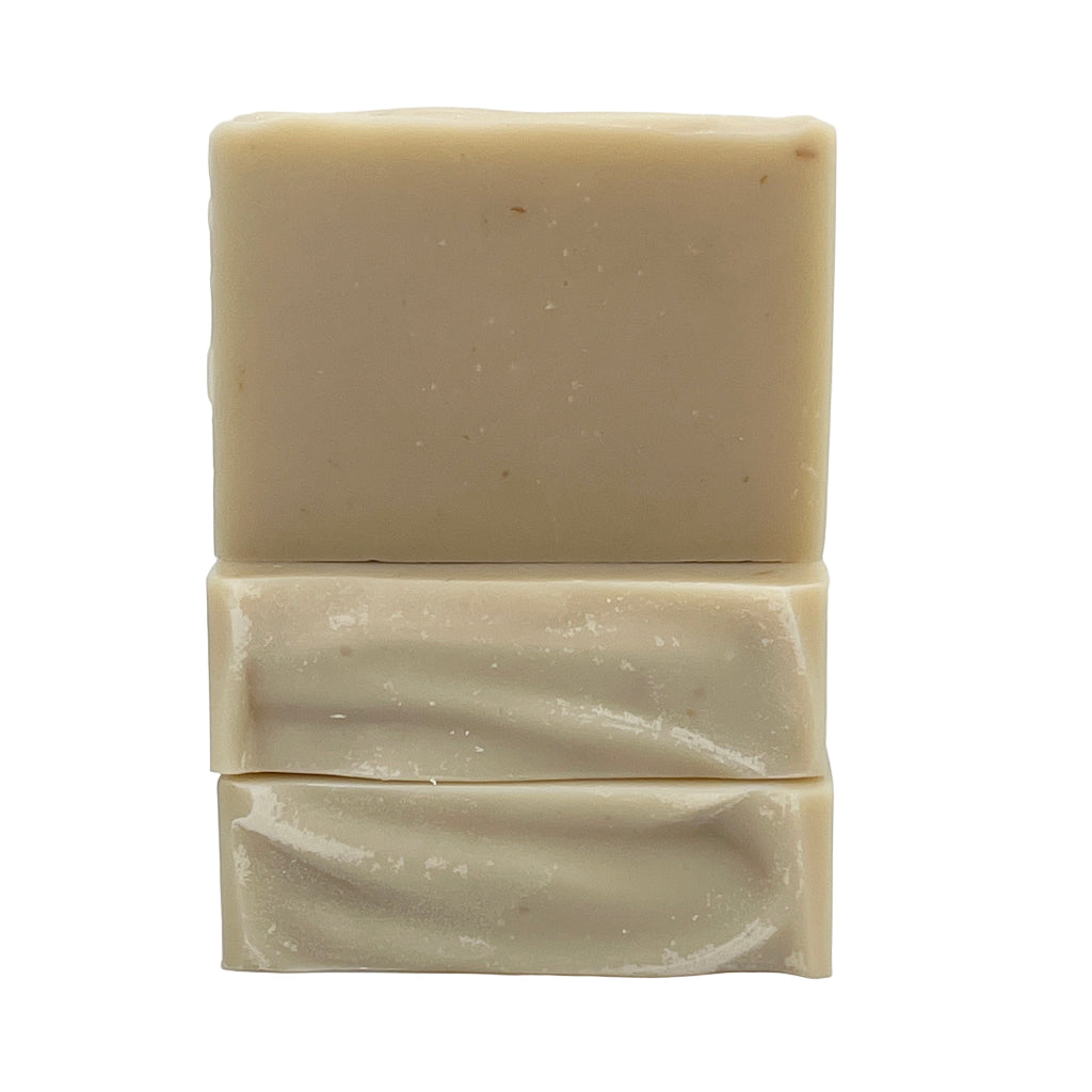 Three bars of ocean and kelp soap bars stacked on a white background