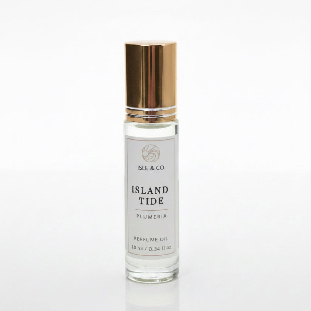 Roll on perfume oil bottle labeled 'Island Tide' by Isle & Co. on a white background