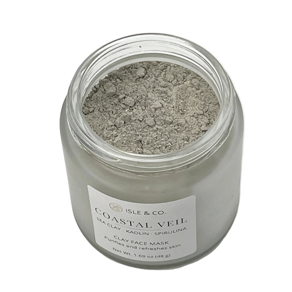 Jar of Isle & Co. Coastal Veil purifying clay face mask on a white background