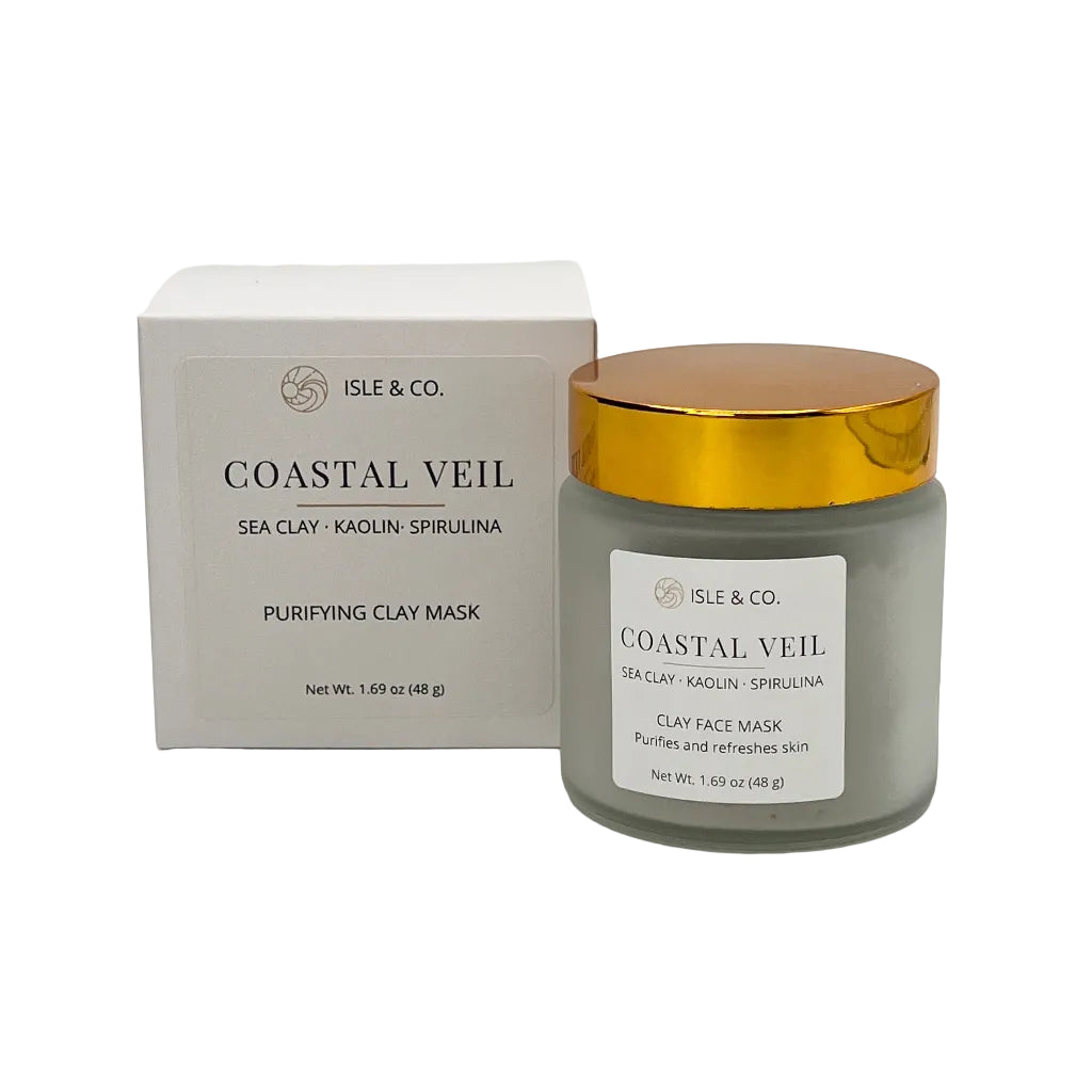 Coastal Veil sea clay mask with gold lid and Isle & Co packaging on a white background