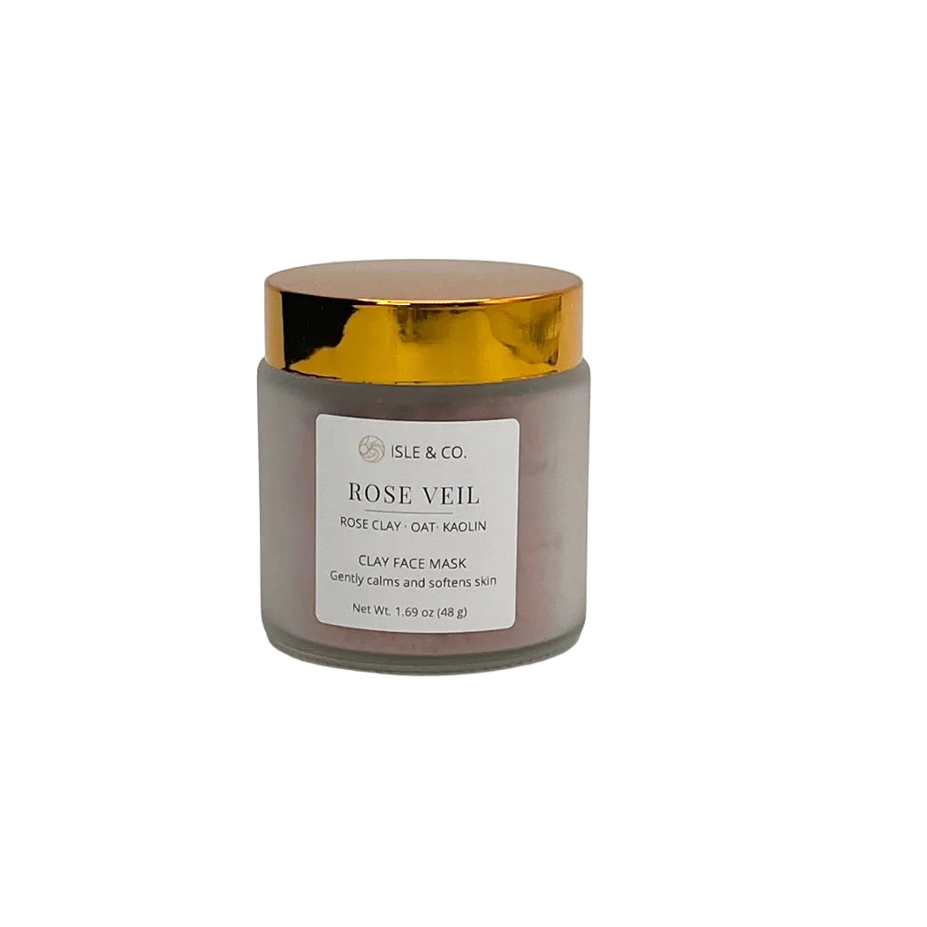 Jar of 'Rose Veil' calming face mask with gold lid on a white background