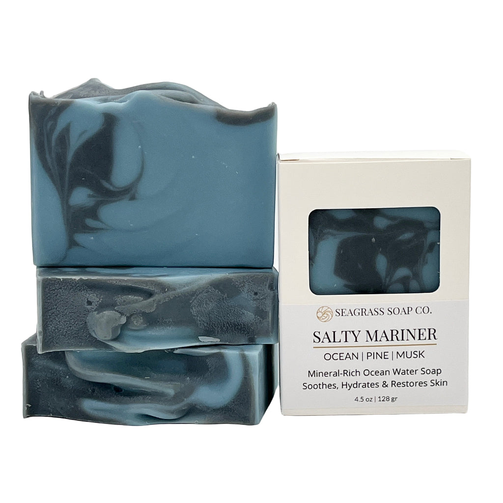 Three bars of soap with a Seagrass Soap Co. packaging on a white background