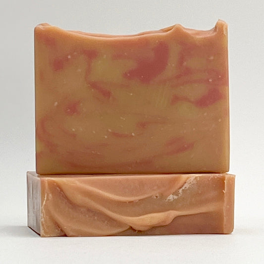 Saratoga Sunset scented with Mango and Papaya and enriched with coconut milk and Shea Butter soap bar on a white background by Seagrass Soap Co.