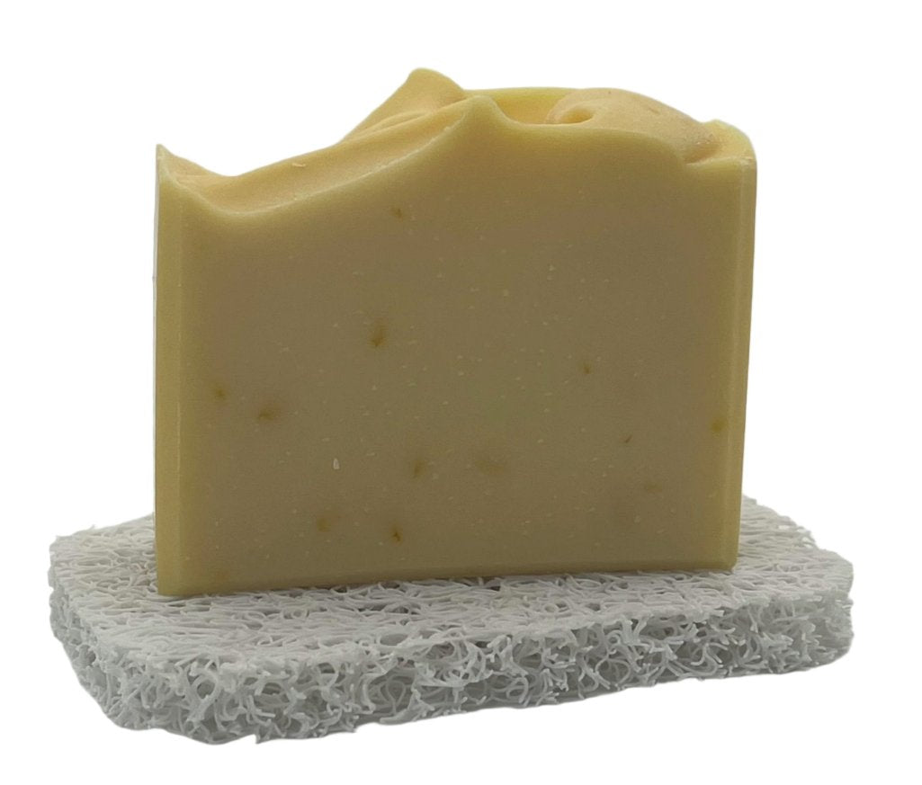 A soap saver pad with a bar of standing soap