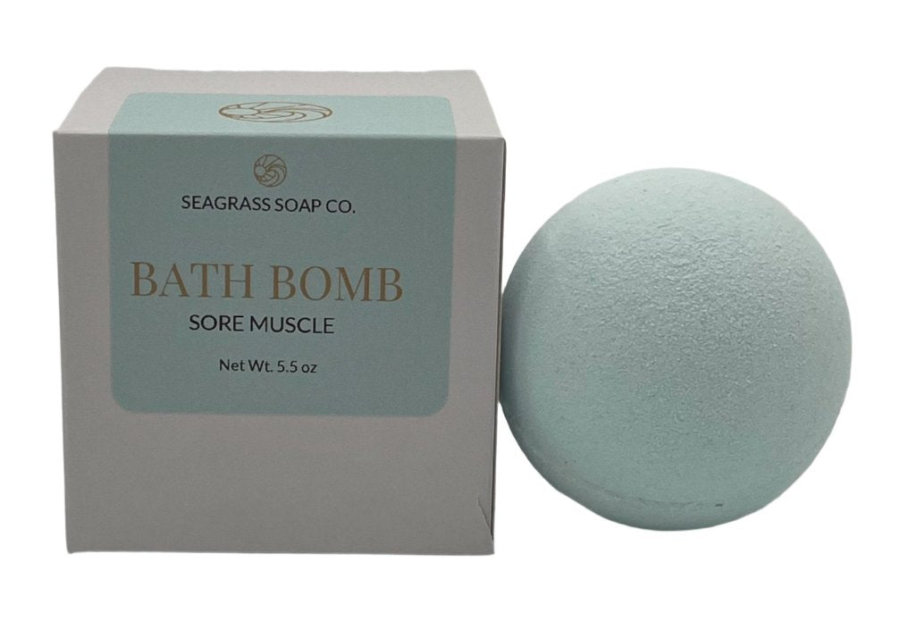 A sore muscle relief bath bomb with box