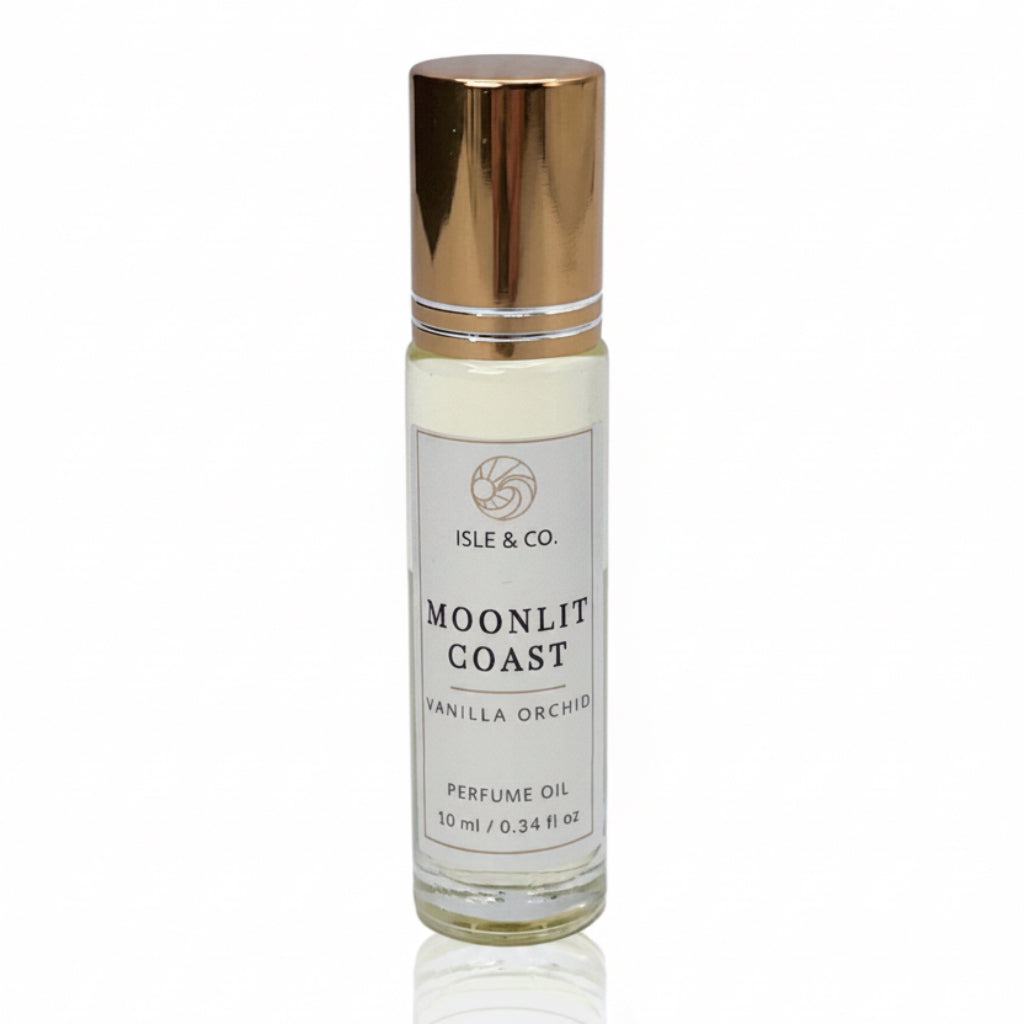Roll on Perfume oil bottle labeled 'Moonlit Coast' by Isle & Co. on a white background